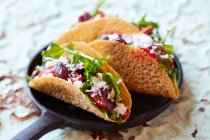 Tacos with provolone cheese and vegetables — Stock Photo