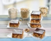 Puffed rice cubes with chickpeas, coconut blossom caramel and chocolate (vegan) — Stock Photo