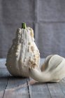 A pale warty squash and a bottle gourd — Stock Photo