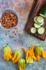 Courgette flowers, lentils and cucumber — Stock Photo