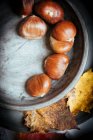Chestnuts in shells (seen from above) — Stock Photo