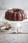 Chocolate Bundt Cake on stand — Stock Photo