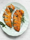 Chicken fillets breaded with panko with herbs — Stock Photo
