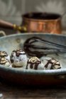 Handmade truffle pralines with chocolate sauce — Stock Photo