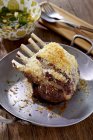 Rack of lamb with a cheese crust — Stock Photo
