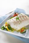 Cod fillet with spring vegetables — Stock Photo