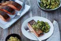 Salty-Sweet Salmon With Ginger and Spicy Cucumber Salad — Stock Photo