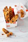 Cantucci for Christmas in box on wooden table — Foto stock