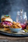 Pulled pork for burgers on table — Stock Photo