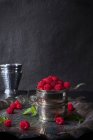 Fresh Wild Raspberried Piled in a Tarnished Silver Cup — Stock Photo