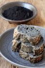 Black bread with activated charcoal — Stock Photo