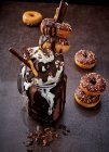 Chocolate Freak Shake coberto com creme e mini donuts — Fotografia de Stock