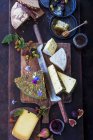 A cheese board with various cheeses (top view) — Stock Photo