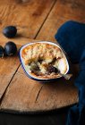 Close-up shot of delicious Rice pudding with damsons — Stock Photo