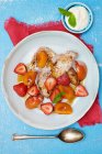 French Toast with strawberries, apricots and powdered sugar — Stock Photo