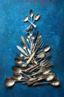 Cutlery laying like a Christmas tree — Stock Photo