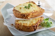 Croque Monsieur with herbs and bean sprouts — Stock Photo