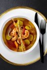 Clear prawn soup with tomatoes, fennel seeds and lemongrass — Stock Photo