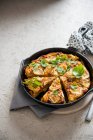 Spanish potatoes tortilla with red peppers and goat's cheese — Stock Photo