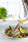 Salad with smoked trout, lemon and herbs — Stock Photo