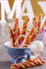 Baked two tone candy canes with a bow — Stock Photo