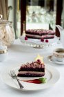 Close-up shot of delicious Festive chocolate and raspberry cake — Stock Photo
