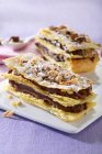 Mille feuilles with chocolate cream and nuts — Stock Photo