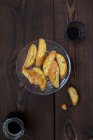 Biscotti alle mandorle italiani con caffè in vetro e barattolo — Foto stock