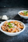 Close-up shot of delicious Rigatoni with cream and mushrooms — Stock Photo