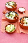 Chili con carne with rice and avocado — Stock Photo