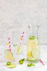 Summer lime lemonade with chili in jug and glasses — Stock Photo