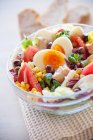 Salad bowl with tuna, olives and mozzarella — Stock Photo