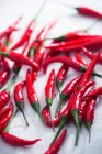 Red hot chili peppers on white background — Stock Photo