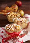 Raisin bread plait bake with apple in jars — Stock Photo