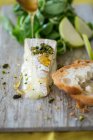 Brie with honey, pistachios, baguette, lettuce and apples — Stock Photo