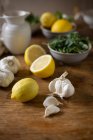 Lemon, garlic and herbs — Stock Photo