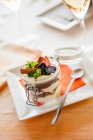 Tiramisu with fresh blackberries, strawberries, mint and cinnamon in jar — Stock Photo