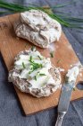 Buckwheat rolls with fresh cheese and chives — Stock Photo
