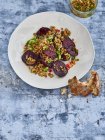 A corn salad with grilled red beets — Stock Photo