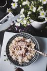 Overnight oats or bircher muesli with coconut and cranberries — Stock Photo