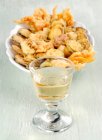 Fritto misto with vegetables and a glass of white wine — Stock Photo