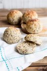 Quark bread rolls with chia seeds on cloth — Stock Photo