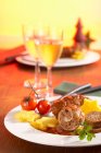Pork roulade with a minced meat filling and polenta stars — Stock Photo