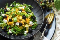 Pumpkin and avocado salad with blackberries and cream cheese — Stock Photo