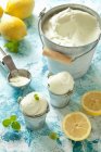 Small pots of limoncello and lemon sorbet with mint — Stock Photo