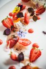Smoked swordfish with strawberries and tomatoes — Stock Photo
