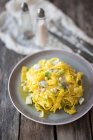 Reginette with gorgonzola and spring onions — Stock Photo
