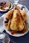 Stuffed capon with chestnuts and chanterelle mushrooms — Stock Photo