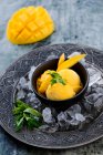 Mango ice cream with mint — Stock Photo