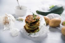 Vegan potato and courgette fritters — Stock Photo